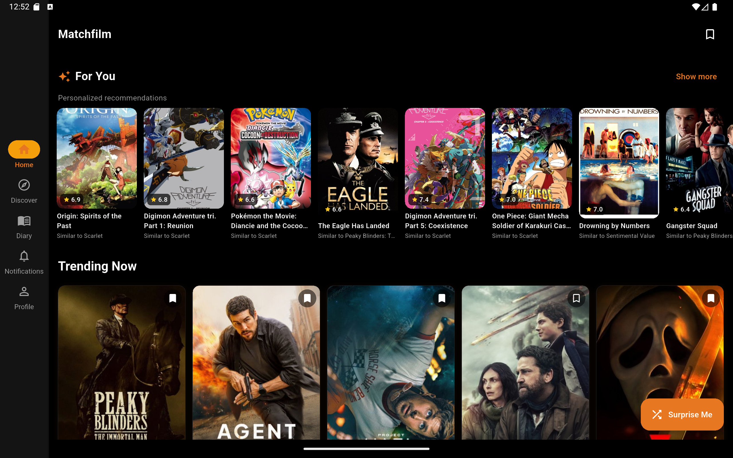 Tablet: inicio con filas personalizadas, tendencias y maquetación cinematográfica